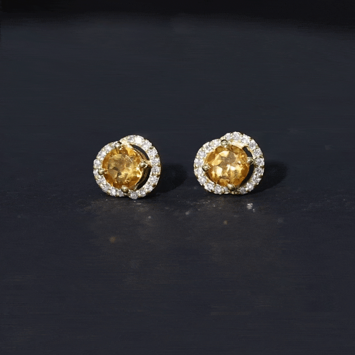 Round citrine and diamond stud earrings by Rosec Jewels featuring yellow gemstones set in a classic earring design.