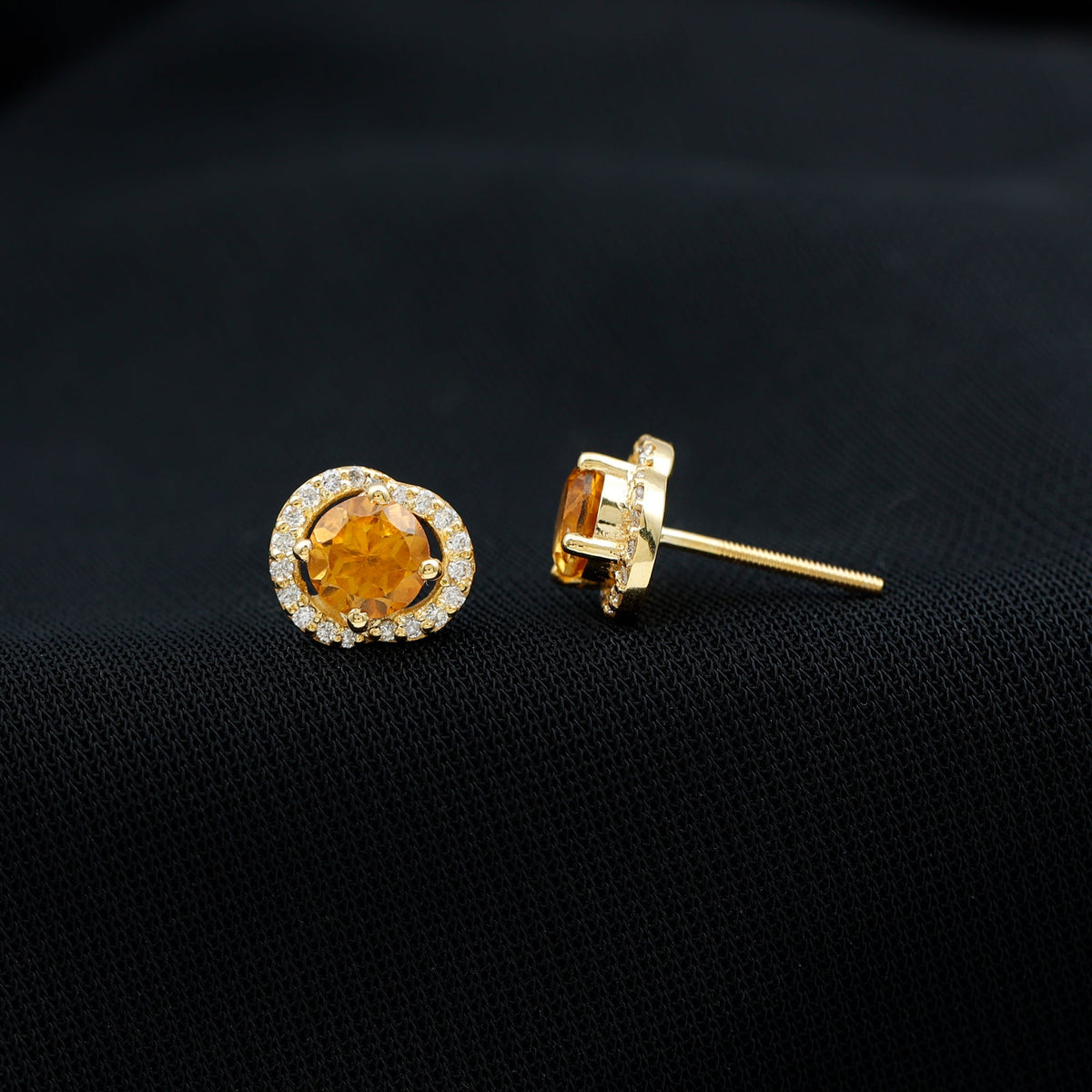 Round citrine and diamond stud earrings by Rosec Jewels featuring gold settings and sparkling gemstone accents.