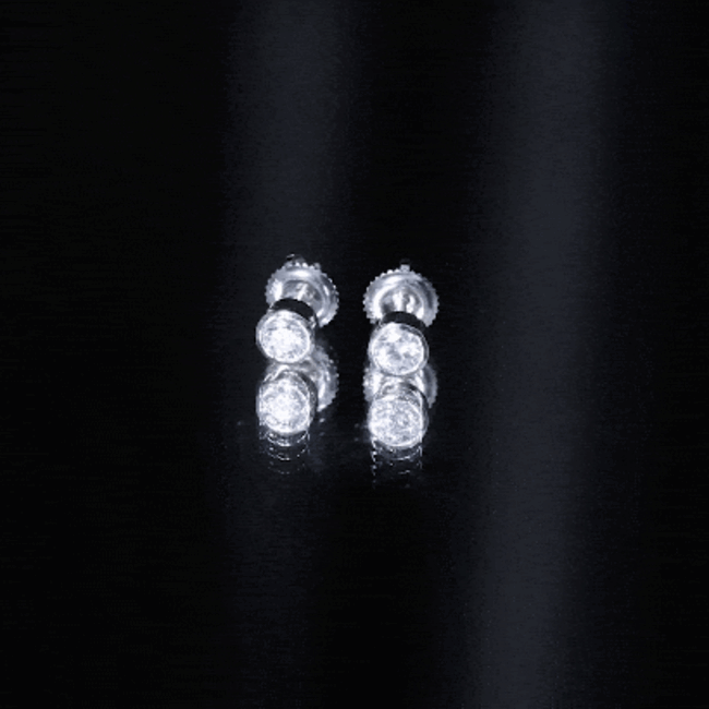 Yellow bezel set lab-grown diamond solitaire stud earrings by Rosec Jewels, featuring sparkling diamonds in a sleek gold setting.