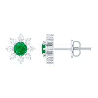 Natural emerald and diamond floral stud earrings by Rosec Jewels featuring intricate design and sparkling gemstones.