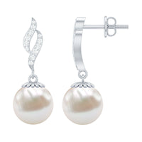 Freshwater pearl drop earrings with diamond accents by Rosec Jewels, featuring elegant pearl and sparkling diamond details.