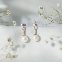 Freshwater pearl drop earrings with diamond accents from Rosec Jewels, featuring elegant pearl and sparkling diamond details.