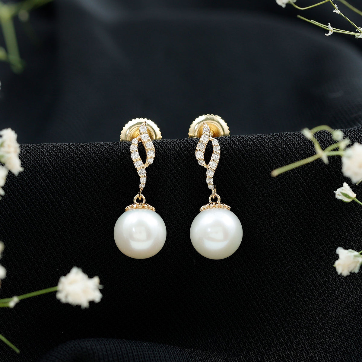 Freshwater pearl drop earrings with diamond accents by Rosec Jewels, featuring 14.9 carats of elegant pearls and sparkling stones.