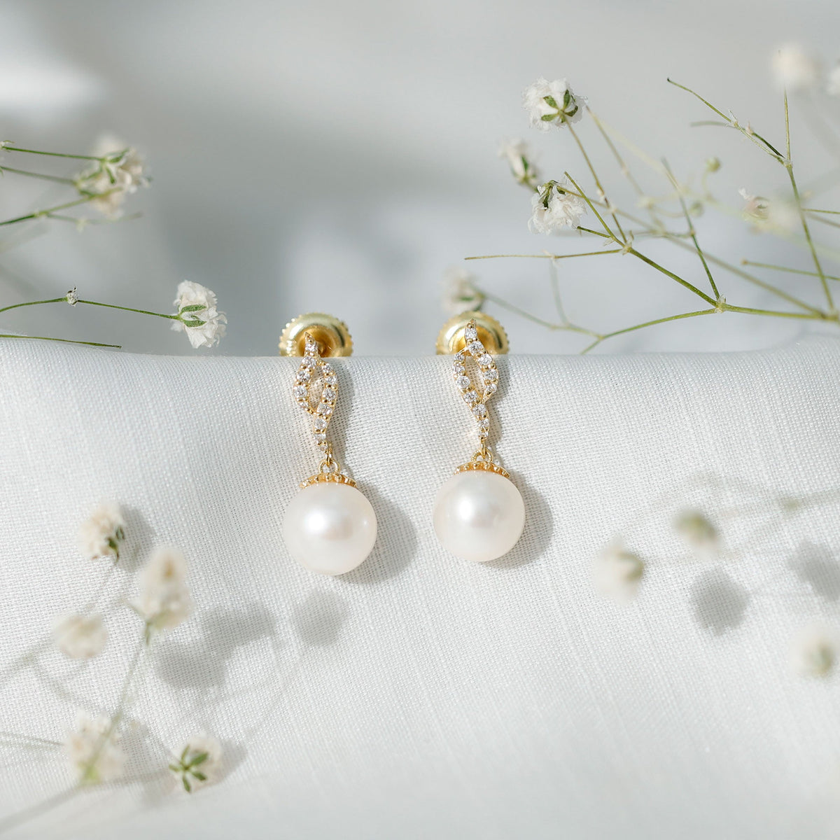 Rosec Jewels 14.9 Carat freshwater pearl drop earrings with diamond accents, elegant jewelry featuring dangling pearls and sparkling stones.