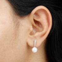 Rosec Jewels 15 Carat freshwater pearl drop earrings with diamond accents, showcasing elegant jewelry design.