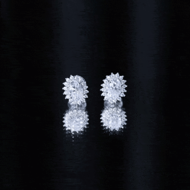 Sterling silver 2 carat oval moissanite halo stud earrings by Rosec Jewels with sparkling gemstone accents.