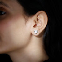 Rosec Jewels 3 Carat Heart Moissanite Halo Stud Earrings featuring sparkling moissanite stones and a silver setting.