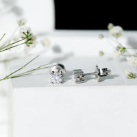 Sterling silver moissanite half-carat stud earrings with a classic design, featuring sparkling gemstones from Rosec Jewels.
