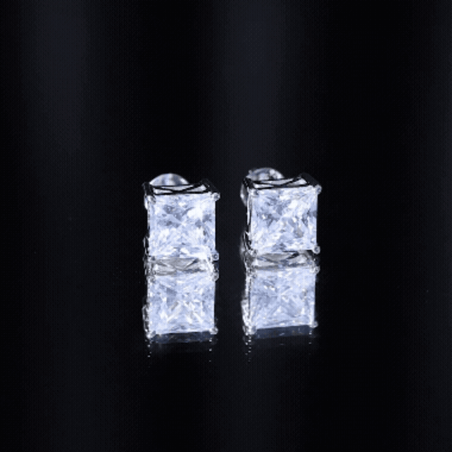 Six-carat princess cut cubic zirconia solitaire stud earrings in silver with a secure post and butterfly back from Rosec Jewels.