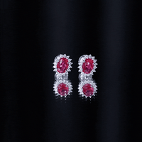 2 Carat Oval Cut Lab Grown Ruby Stud Earrings with Moissanite Halo