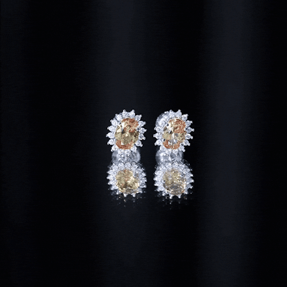 Rosec Jewels 2 Carat lab-grown yellow sapphire stud earrings with halo setting, featuring a sparkling yellow gemstone and elegant design.