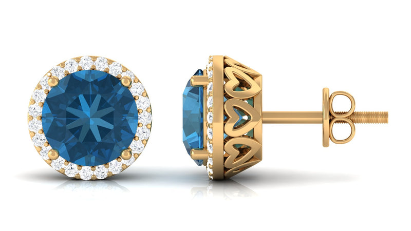 London Blue Topaz stud earrings with diamond halo setting from Rosec Jewels, showcasing sparkling blue gemstones and elegant design.