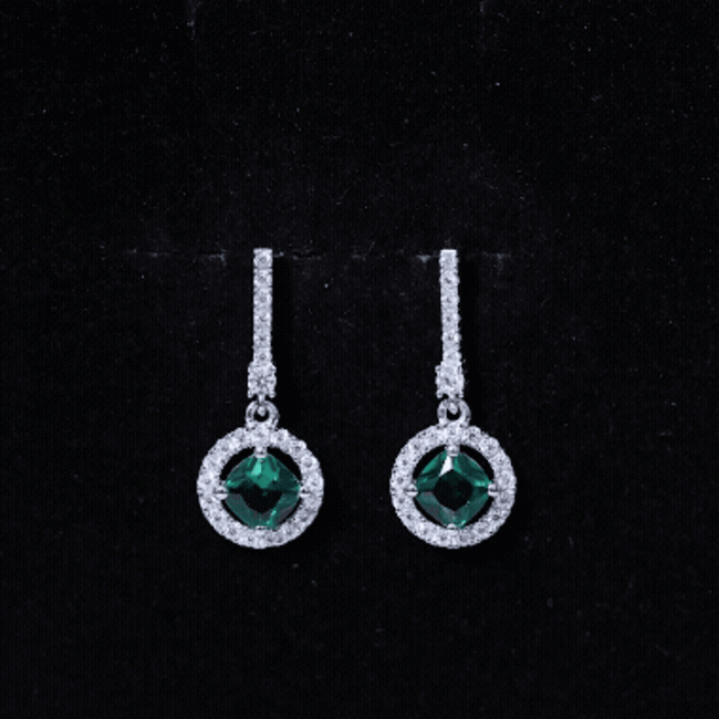 Lab grown 1.8 carat emerald drop earrings with moissanite by Rosec Jewels, featuring sparkling green gemstones and elegant design.