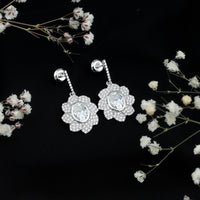 Bezel Set 2.5 Carat Oval Moissanite Flower Drop Earrings