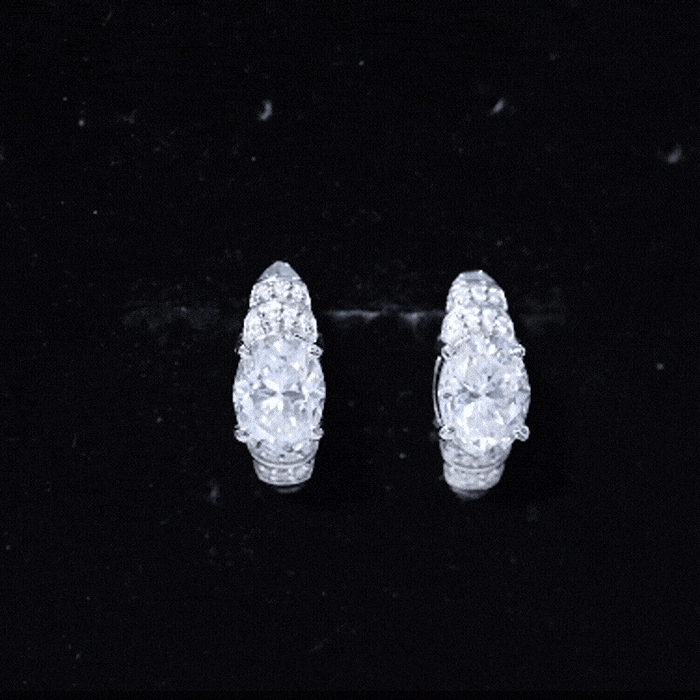 Elegant 2.5 carat moissanite Art Deco stud earrings in 14K gold-plated silver, featuring intricate geometric design.