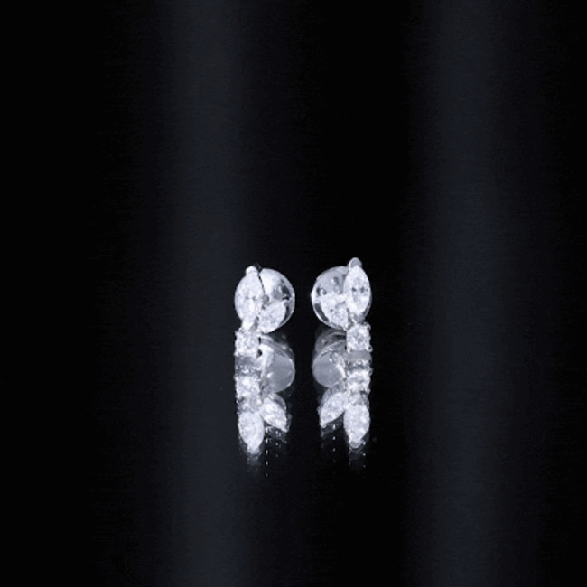 Certified Moissanite Playboy stud earrings in 14K gold plated silver featuring playful, sophisticated jewelry design by Rosec Jewels.