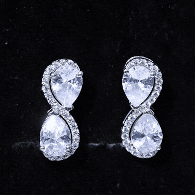 Rosec Jewels 5 Carat Designer Moissanite stud earrings with certificate, showcasing sparkling white gemstones on a classic earring setting.