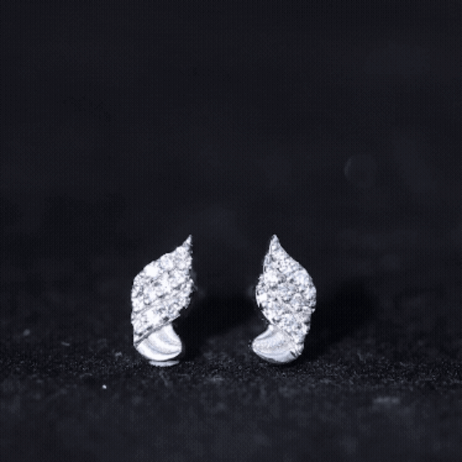 Silver contemporary moissanite leaf stud earrings with detailed leaf design by Rosec Jewels.