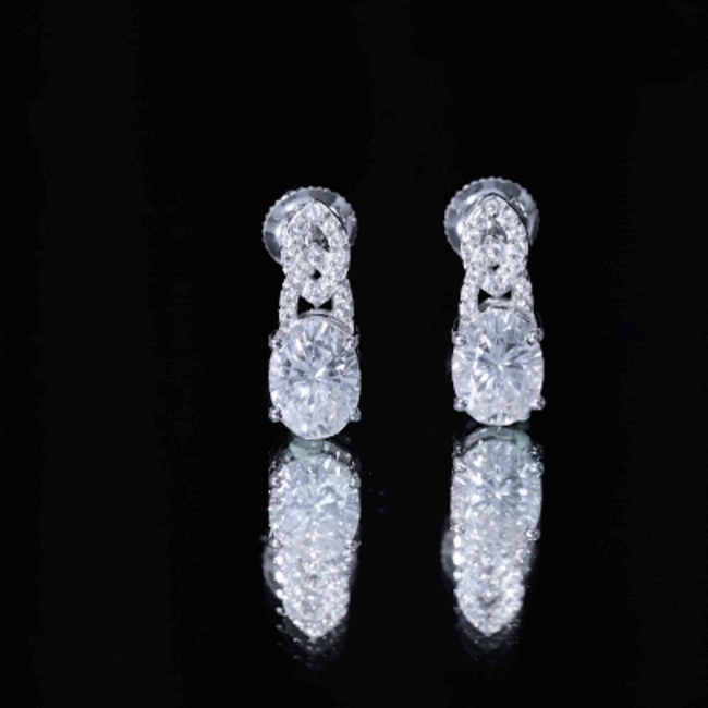Certified 2.58 carat oval moissanite drop earrings with screw back from Rosec Jewels, showcasing elegant jewelry design.
