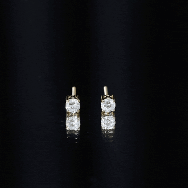 Yellow brilliant cut diamond solitaire stud earrings in prong setting by Rosec Jewels showcasing elegant jewelry design