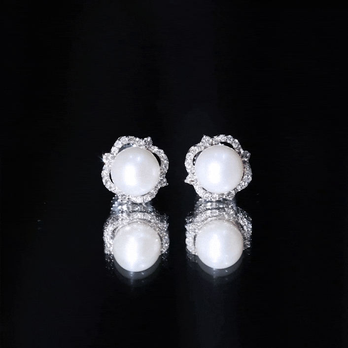 Rosec Jewels cultured pearl stud earrings with diamond accents, showcasing elegant white pearls and sparkling gemstones.