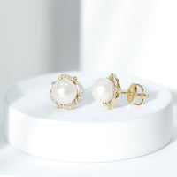 Rosec Jewels cultured pearl stud earrings with diamonds, showcasing elegant pearl and sparkling diamond accents on classic earrings.