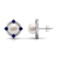 Real freshwater pearl and blue sapphire modern stud earrings by Rosec Jewels, featuring elegant pearl and sapphire accents.