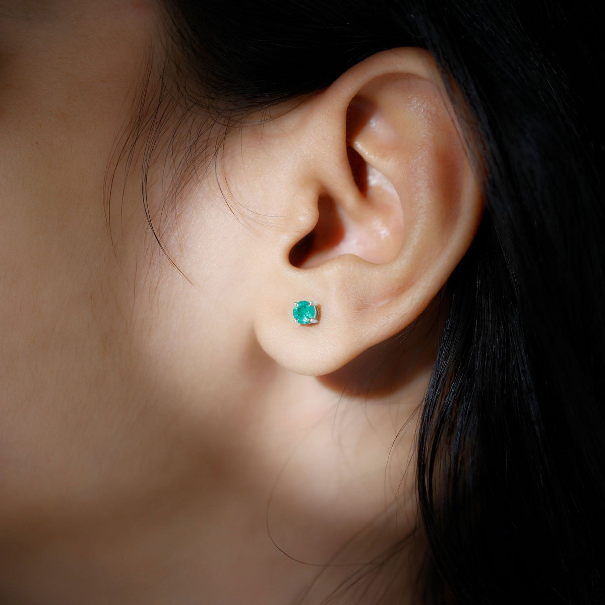 Round cut 5mm real emerald stud earrings by Rosec Jewels featuring vibrant green gemstones in classic jewelry style.