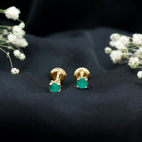 Round cut 5 mm real emerald stud earrings by Rosec Jewels, showcasing sparkling green gemstones set in classic earrings.