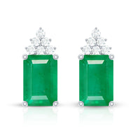 Genuine 1.32 Carat emerald cut emerald stud earrings with diamond cluster by Rosec Jewels, showcasing sparkling green gemstones and elegant design.
