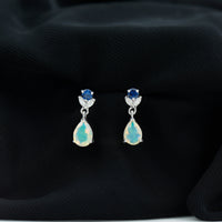 1.4 Carat Ethiopian Opal Teardrop Earrings with Lab Blue Sapphire