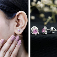 Lab grown pink sapphire heart stud earrings with diamond halo, featuring 0.6 carats, from Rosec Jewels.