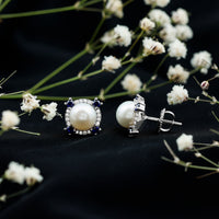 Vintage freshwater pearl earrings with blue sapphire accents from Rosec Jewels, featuring elegant, classic jewelry design.