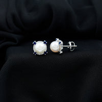Vintage freshwater pearl earrings with blue sapphire accents, featuring elegant design by Rosec Jewels