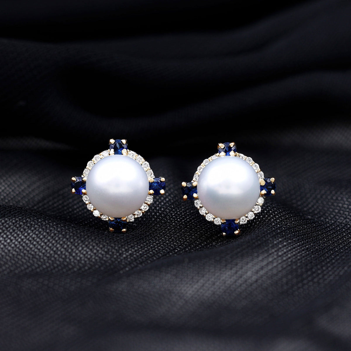 Natural freshwater pearl vintage earrings with blue sapphire accents by Rosec Jewels, featuring elegant pearl and sapphire design.