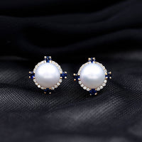 Natural freshwater pearl vintage earrings with blue sapphire accents by Rosec Jewels, featuring elegant pearl and sapphire design.