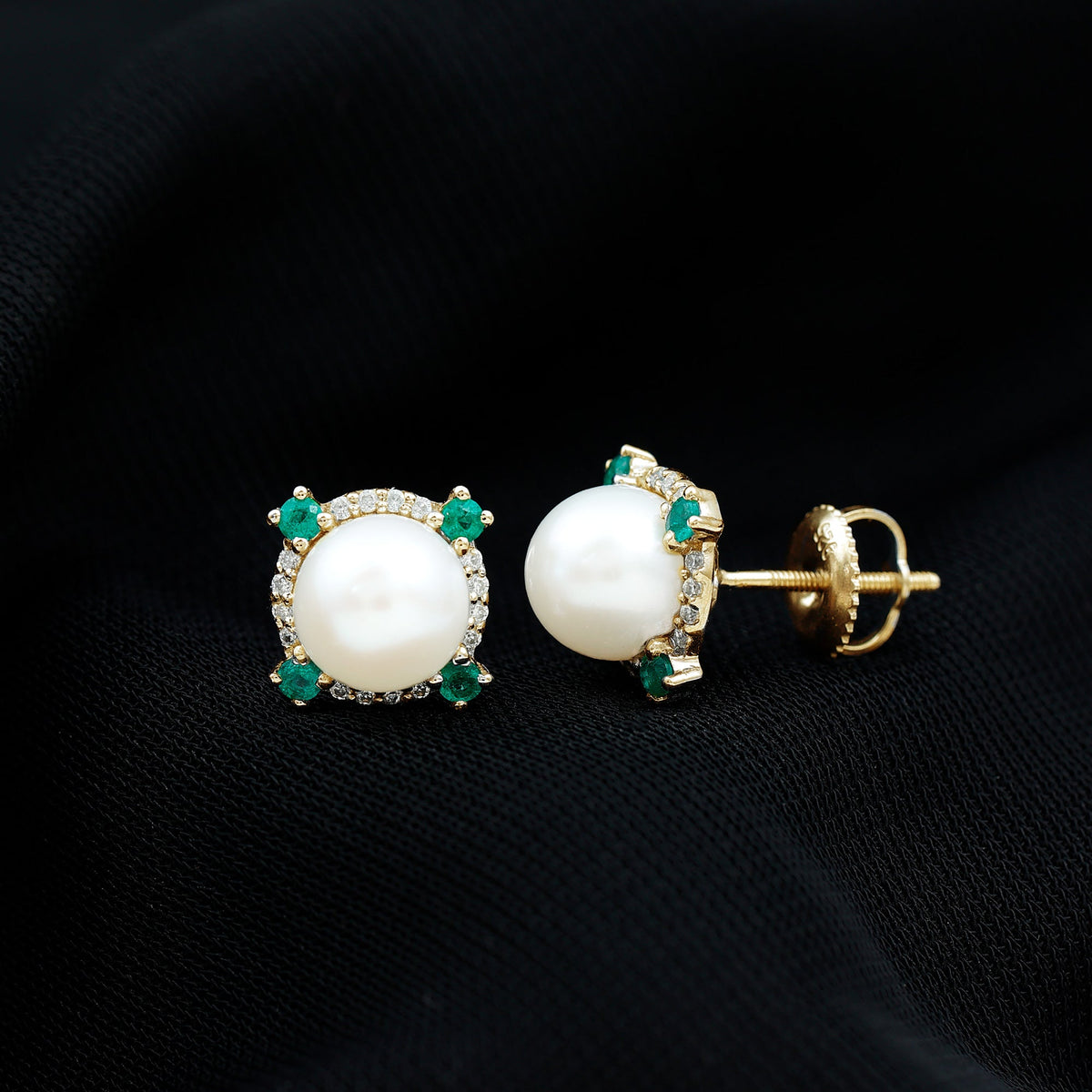 Six-carat freshwater pearl bridal stud earrings with emerald accents by Rosec Jewels, featuring elegant pearl and gemstone detailing.