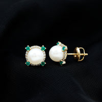Six-carat freshwater pearl bridal stud earrings with emerald accents by Rosec Jewels, featuring elegant pearl and gemstone detailing.