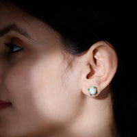 Rosec Jewels 6 Carat freshwater pearl bridal stud earrings with emerald accents, featuring elegant pearl and green gemstone design.