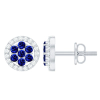 Lab-created blue sapphire flower earrings with diamond halo, featuring elegant floral design and sparkling accents from Rosec Jewels.