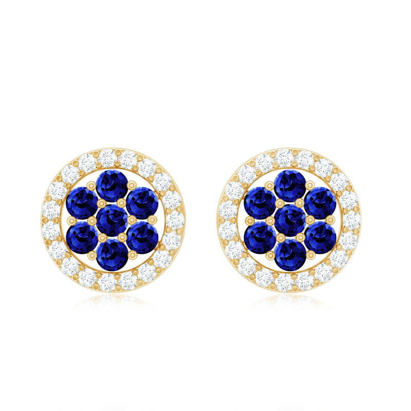 Lab-created blue sapphire flower earrings with diamond halo from Rosec Jewels, featuring vibrant blue sapphires and sparkling diamonds.