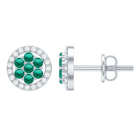 Lab created emerald flower earrings with diamond halo, featuring intricate floral design and sparkling gemstone accents.