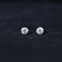 Minimalist 0.63 Carat Round Moissanite Solitaire Stud Earrings