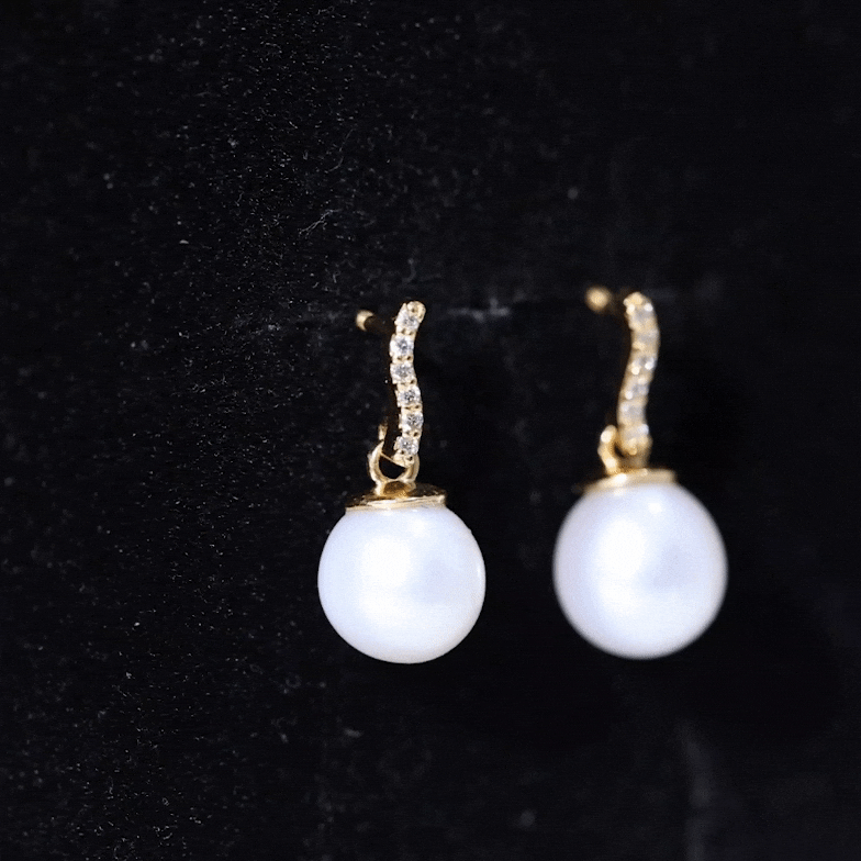 14 carat freshwater pearl drop earrings with diamond accents by Rosec Jewels, featuring elegant yellow gold settings.