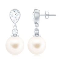 Freshwater pearl and moissanite drop earrings by Rosec Jewels featuring elegant pearl and sparkling gemstone accents.