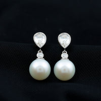 Freshwater pearl and moissanite drop earrings by Rosec Jewels, featuring elegant pearl and sparkling gemstone design.