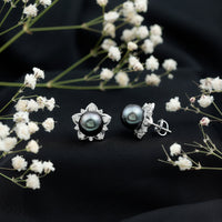 Genuine Tahitian black pearl and diamond flower stud earrings by Rosec Jewels featuring elegant pearl and sparkling diamonds.