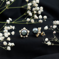 Genuine Tahitian black pearl and diamond flower stud earrings by Rosec Jewels featuring elegant jewelry design.