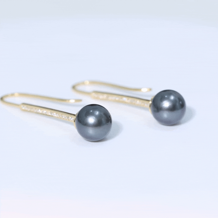 Genuine 15 CT Tahitian black pearl and diamond dangle earrings by Rosec Jewels featuring yellow gold settings.