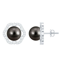 Tahitian black pearl and diamond flower stud earrings by Rosec Jewels featuring 15 carats of elegant jewelry design